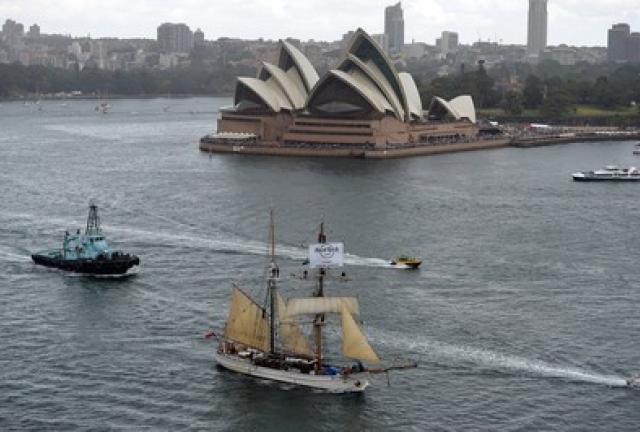 Tall ships sail in front of the iconic Opera House in Sydney Harbour on October 3, 2013, on the eve of the International Fleet Review. Tall ships sail in front of the iconic Opera House in Sydney Harbour on October 3, 2013, on the eve of the International Fleet Review.