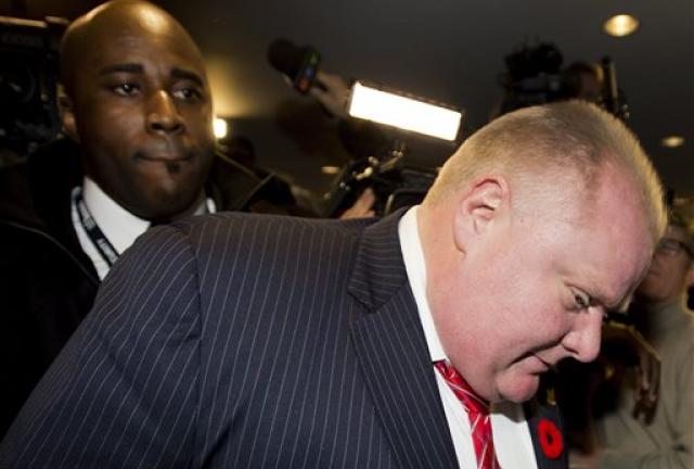 Toronto Mayor Rob Ford arrives at his office, surrounded by the media in Toronto on Friday, Nov. 8, 2013. Toronto Mayor Rob Ford arrives at his office, surrounded by the media in Toronto on Friday, Nov. 8, 2013.