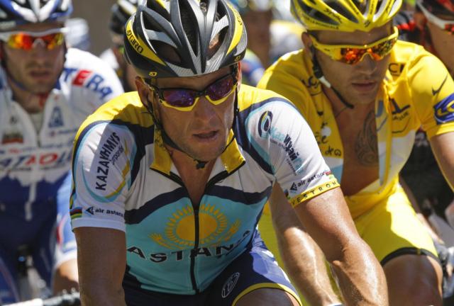In this July 11, 2009 file photo, American seven-time Tour de France winner Lance Armstrong, left, and Rinaldo Nocentini of Italy, wearing the overall leader's yellow jersey, right, climb towards Col de Port , France, during the 8th stage of the Tour de France cycling race over 176.5 kilometers (109.7 miles) with start in Andorra and finish in Saint-Girons, France. When Alex Gibney set out to document the cyclist Armstrongâs 2009 Tour de France comeback, the filmmaker admits he bought into the hype: The man whoâd cheated death was coming back to reign supreme -- clean. Gibney's documentary, "The Armstrong Lie, " from Sony Pictures Classics releases Friday, Nov. 8, 2013. In this July 11, 2009 file photo, American seven-time Tour de France winner Lance Armstrong, left, and Rinaldo Nocentini of Italy, wearing the overall leader's yellow jersey, right, climb towards Col de Port , France, during the 8th stage of the Tour de France cycling race over 176.5 kilometers (109.7 miles) with start in Andorra and finish in Saint-Girons, France. When Alex Gibney set out to document the cyclist Armstrongâs 2009 Tour de France comeback, the filmmaker admits he bought into the hype: The m