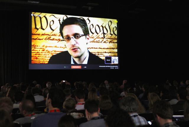 NSA whistleblower Edward Snowden speaks via videoconference at 'A Virtual Conversation with Edward Snowden' during the 2014 SXSW Music, Film + Interactive Festival at Austin Convention Center on March 10, 2024 in Austin, Texas.