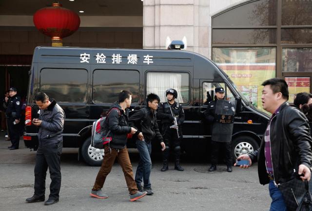 Chinese SWAT stand on duty at Beijing Railway Station on March 2, 2024 in Beijing, China.