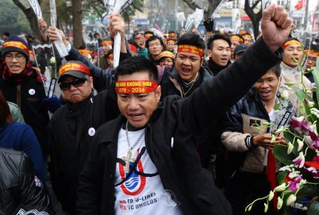 Protesters shout anti-China slogans during an unofficial rally marking the 35th anniversary of the border war with China in downtown Hanoi, Feb. 16. 2014. Protesters shout anti-China slogans during an unofficial rally marking the 35th anniversary of the border war with China in downtown Hanoi, Feb. 16. 2014.