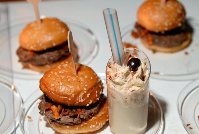Pimento cheeseburgers and a white Russian milkshake are served at the BLT Burger booth at Vegas Uncork'd by Bon Appetit's Grand Tasting event at Caesars Palace on May 9, 2024 in Las Vegas, Nevada.