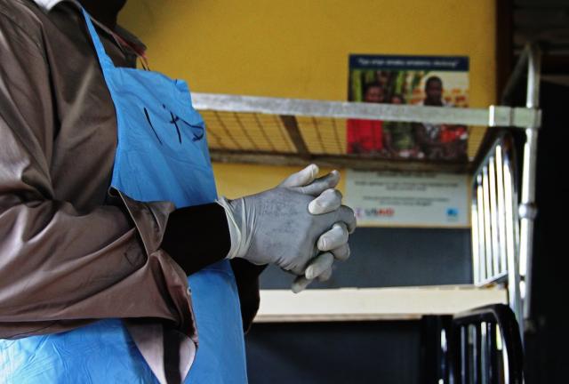A Ugandan health official stands inside a newly prepared isolation center at Nyimbwa Health Center, Luweero District, about 70 Kilometers from Kampala on November 15, 2012.