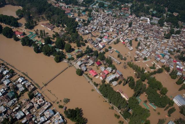 An aerial view of residential houses submerged in flood waters on September 10, 2024 in Srinagar, the summer capital of Indian administered Kashmir, India. 