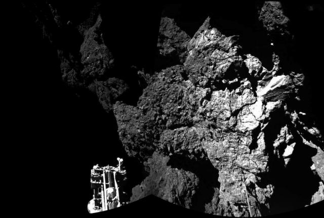The image shows the sRosettas lander Philae is safely on the surface of Comet 67P/Churyumov-Gerasimenko on November 13, 2014.