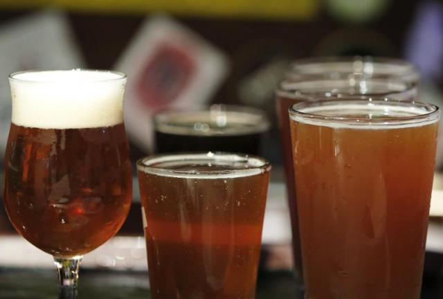 Glasses of craft beer sit ready to be served inside the Bakusyu Club Popeye bar in the Ryogoku neighborhood of Tokyo, Japan, on Friday, May 1, 2015. Glasses of craft beer sit ready to be served inside the Bakusyu Club Popeye bar in the Ryogoku neighborhood of Tokyo, Japan, on Friday, May 1, 2015.