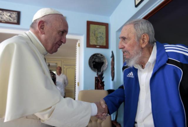 Pope Francis greets former Cuban President Fidel Castro.