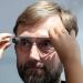 An attendee is fitted with Google Glass during the Google I/O developer conference on May 17, 2024 in San Francisco, California. 