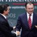 Mexico's President Enrique Pena Nieto (L) shakes hands with Mexico's Finance Minister Luis Videgaray during the presentation of the fiscal reform at Los Pinos presidential residence in Mexico City, September 8, 2013.