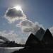 Clouds drift over the Opera House (below-R) and the Harbour Bridge (below-L) in Sydney on May 28, 2024 ahead of rain predicted for the area on May 29 and well into the following week.
