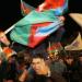 Supporters of Azerbaijan's President Ilham Aliyev celebrate his victory in the presidential elections in Baku, Azerbaijan, Wednesday, Oct. 9, 2013.
