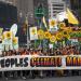 People protest for greater action against climate change during the People's Climate March on September 21, 2024 in New York City.
